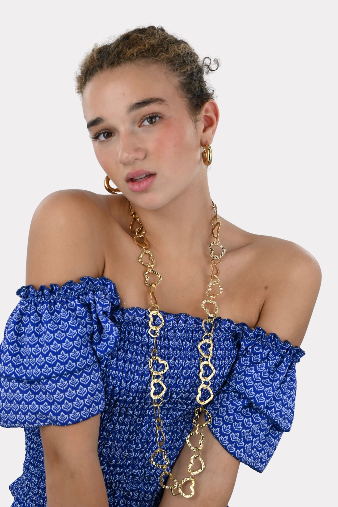 Connected hearts necklace - goud